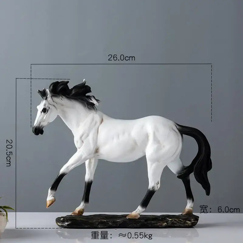 Elegant horse resin statue in white and black resin with flowing mane on a dark stone base for living room decor