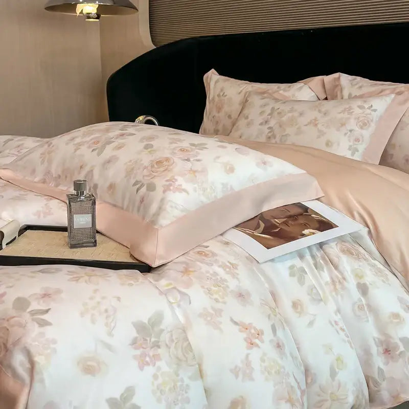Pastel floral satin bedding set in soft pink and cream tones made from decorbites eucalyptus fiber for elegant bedroom decor