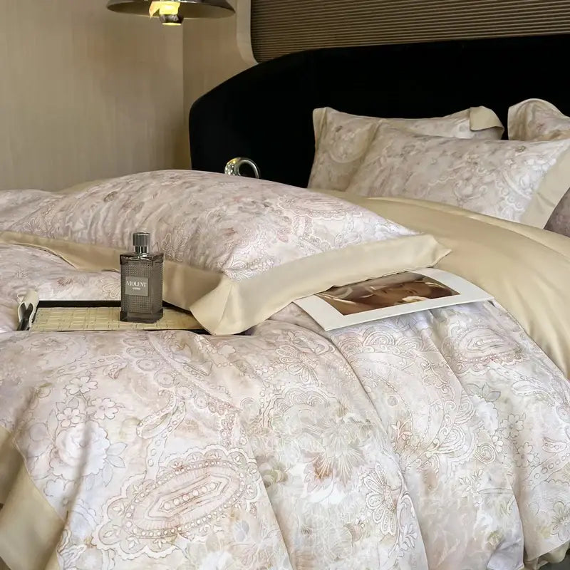 Beige and cream paisley-patterned satin bedding set with gold-toned embroidery made from eucalyptus fiber by decorbites