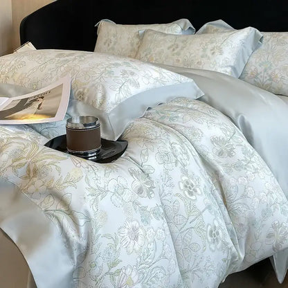 Light blue satin duvet cover with delicate gray and gold floral embroidery in decorbites eucalyptus fiber bedding set