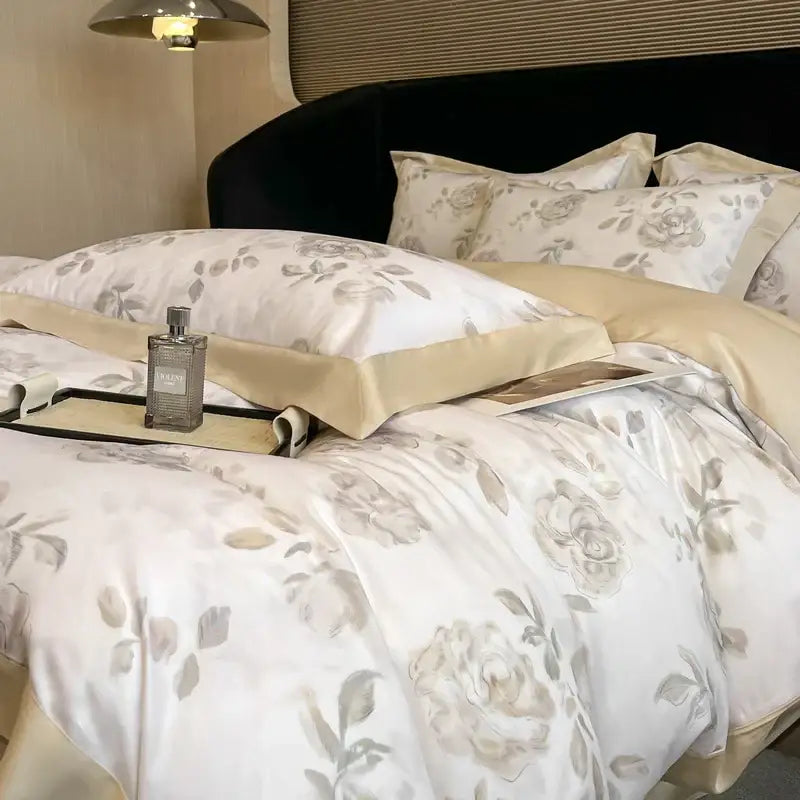 Elegant ivory satin eucalyptus fiber bedding set with gray floral embroidery and soft gold trim for decorbites eucalyptus fiber decor