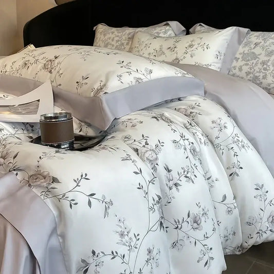 Elegant ivory satin bedding set with delicate gray floral embroidery made from eucalyptus fiber for decorbites eucalyptus fiber collection