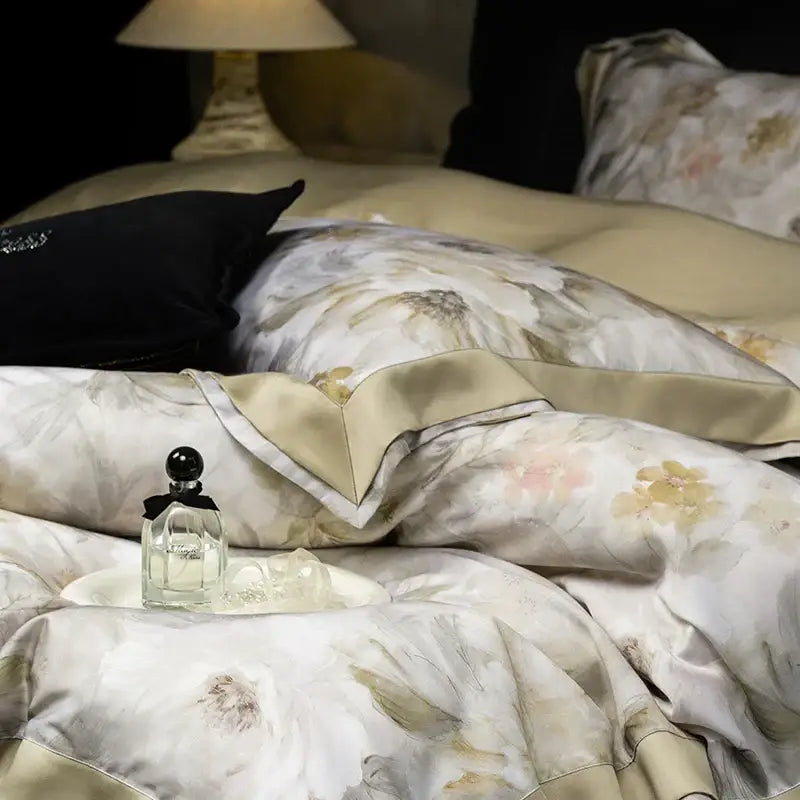 Elegant ivory and gold floral print eucalyptus fiber bedding set with satin sheen for a luxurious bedroom look