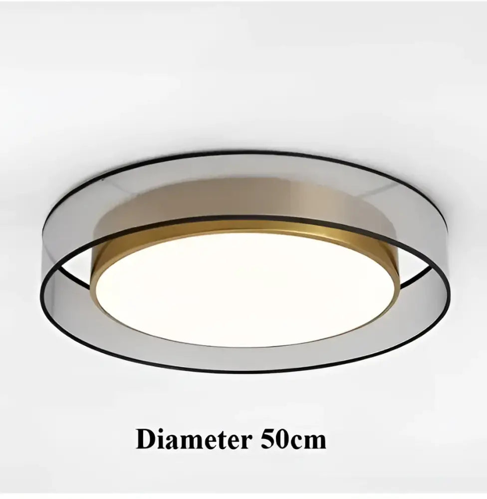 Elegant led dual purpose chandelier featuring a gold-toned central ring and clear acrylic outer rings for living room use