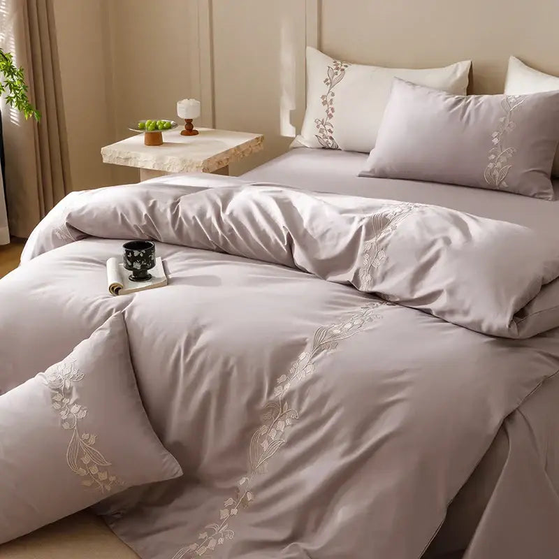 Elegant lily brown and white cotton bedding set features muted lavender satin duvet with white floral embroidery decorbites elegant lily