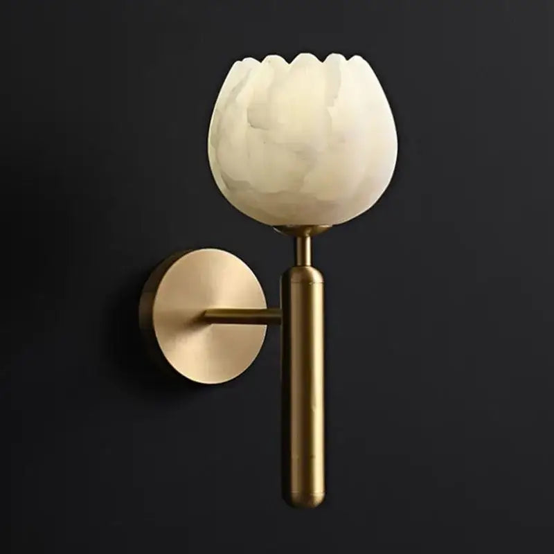 Elegant lotus gold and marble wall lamp with a white flower-shaped glass lampshade mounted on brass arm