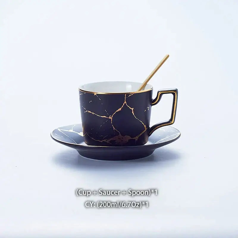 Elegant black marble ceramic tea set cup with gold crackle design and matching saucer with wooden spoon