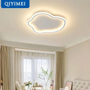 Elegant master bedroom chandelier featuring a modern white cloud led light with warm ambient glow for decorbites elegant master