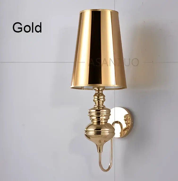 Elegant gold-toned decorbites guards wall lamps set featuring polished brass detailing and conical wall lamps for bedroom use