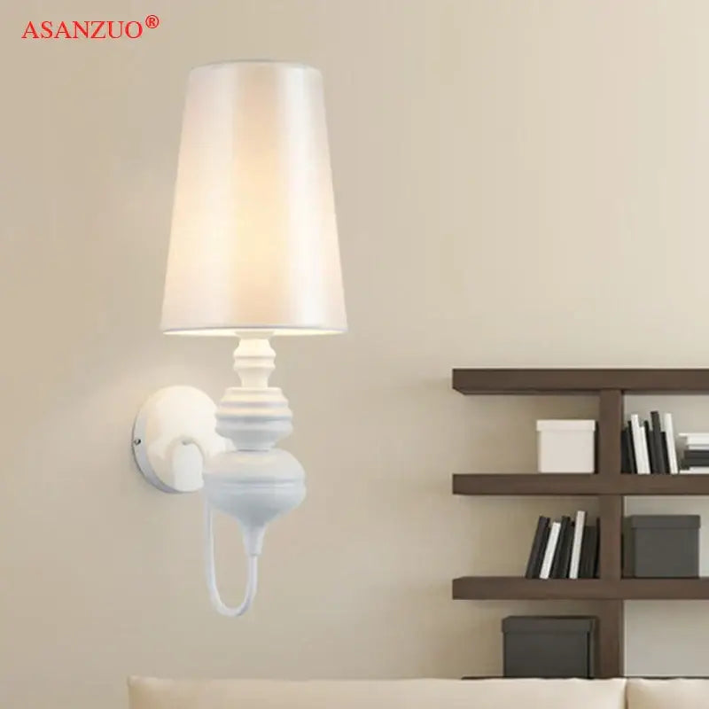 Elegant white asanzuo wall lamps with soft tapered fabric shade and ornate ceramic base from decorbites guards wall lamps set