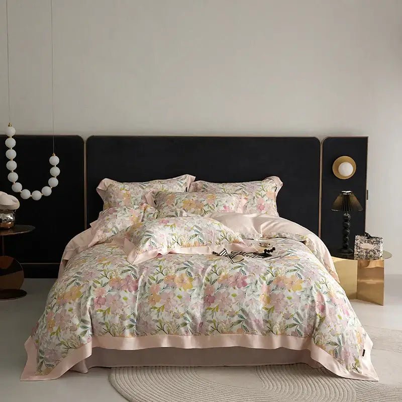 Delicate floral-patterned satin duvet bedding set in pastel pinks with pink trim from decorbites eucalyptus fiber collection