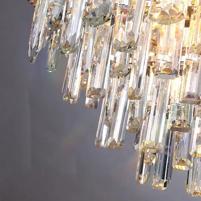 Elegant multi tiered pendant lights with clear crystal prisms and golden accents for dining room decorbites elegant room lights