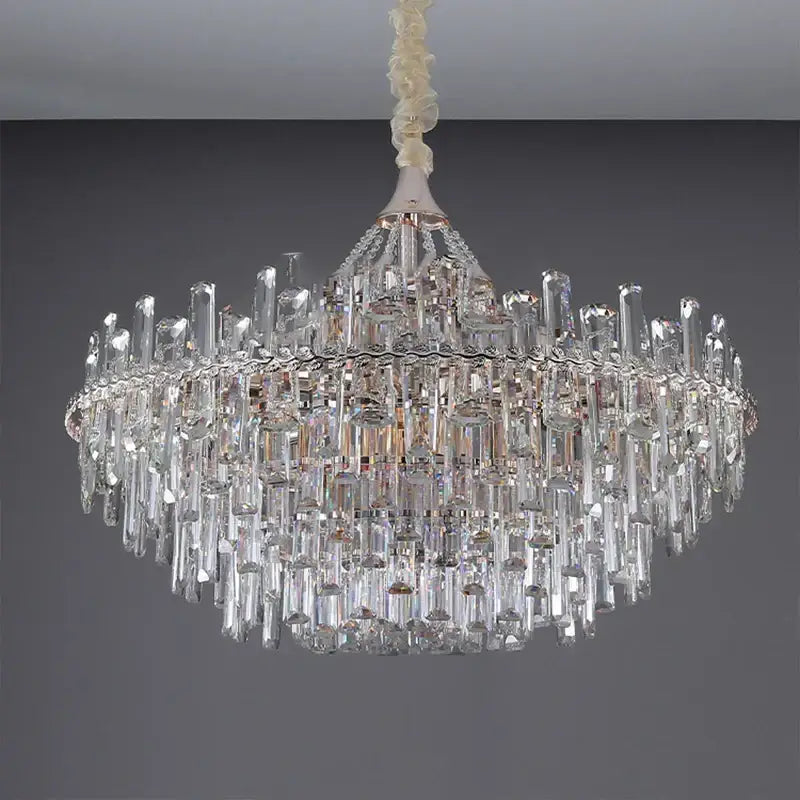 Elegant multi tiered crystal pendant lights with clear glass prisms and cream chain suspension for dining room decorbites elegant room