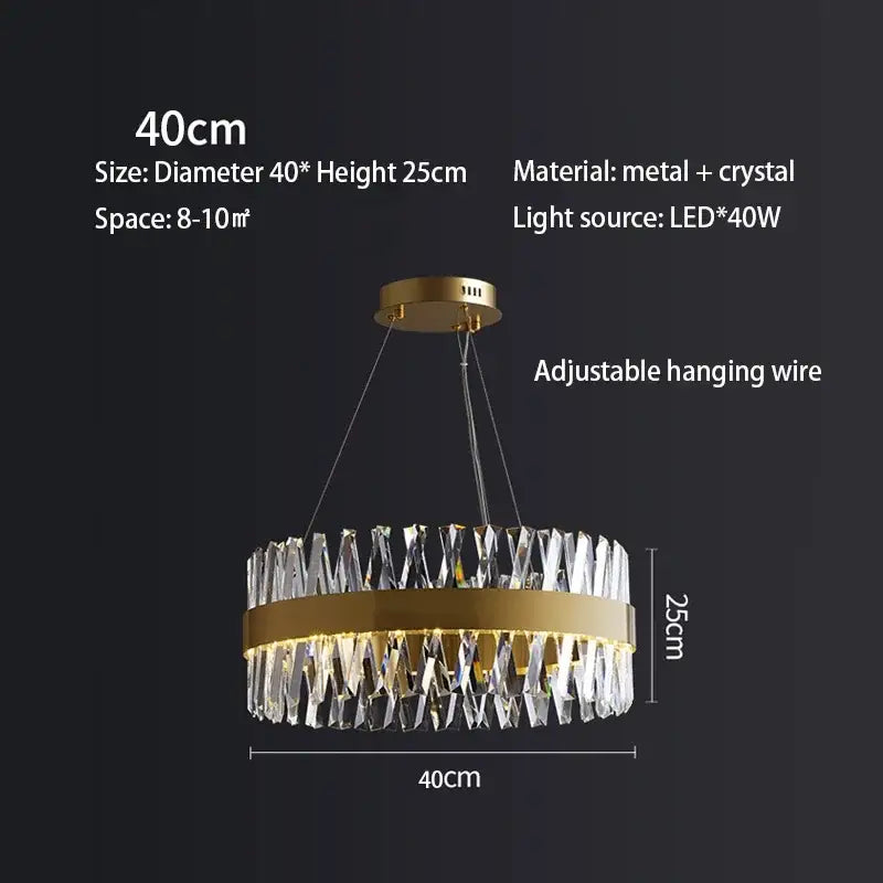 Elegant oval crystal chandelier with decorbites brushed gold rings and clear accents, featuring adjustable hanging wire