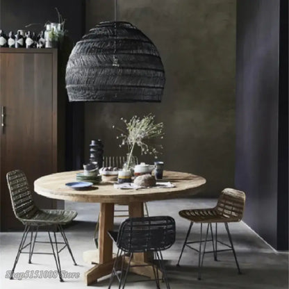Black woven wicker pendant light with a textured layered tiered dome design by decorbites elegant rattan for dining room decor