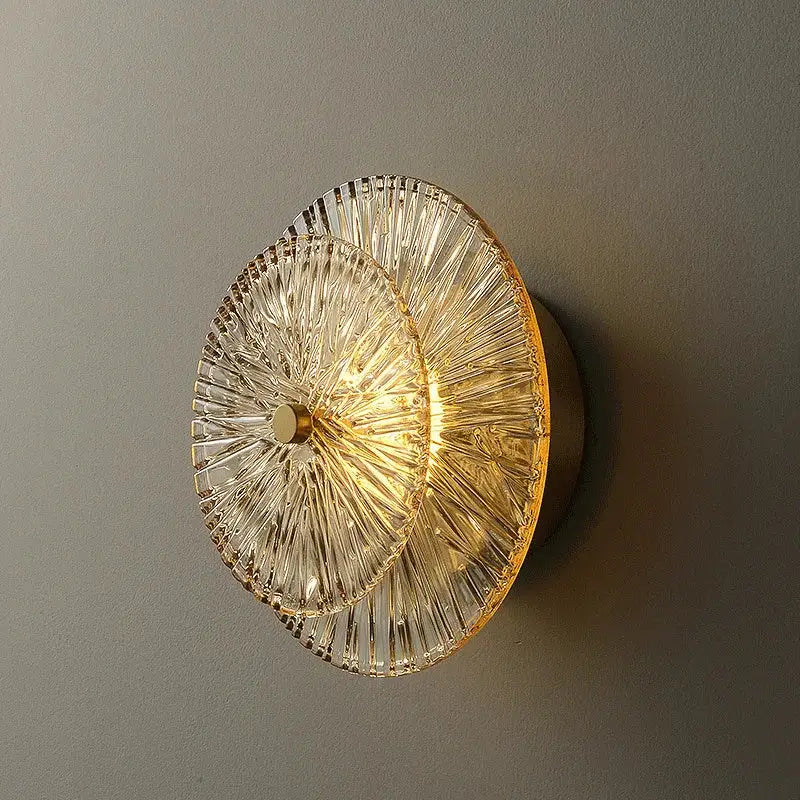 Elegant glass wall sconce with clear ribbed glass and gold-toned metallic base for decorbites elegant glass wall decorbites elegant glass wall