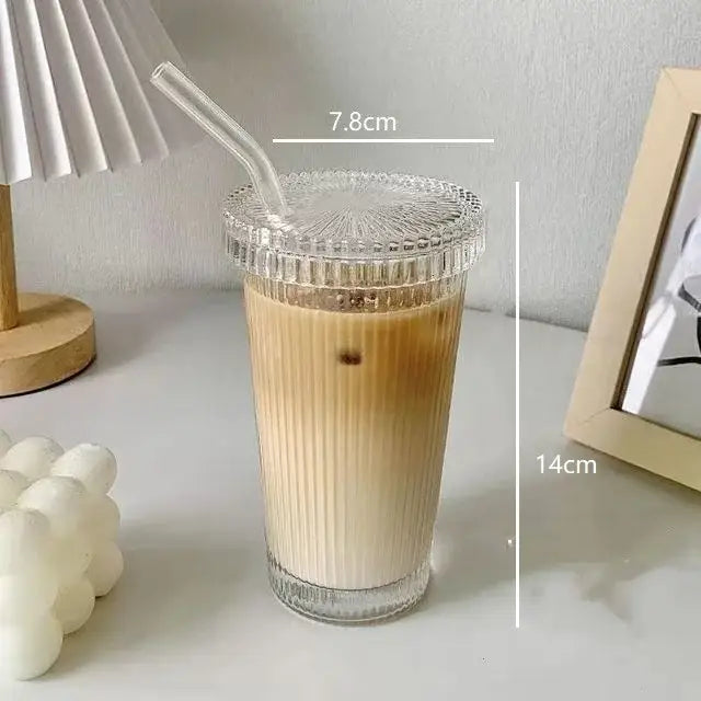 Elegant clear ribbed glass straw cup with matching textured lid and straw from decorbites glass drinkware collection