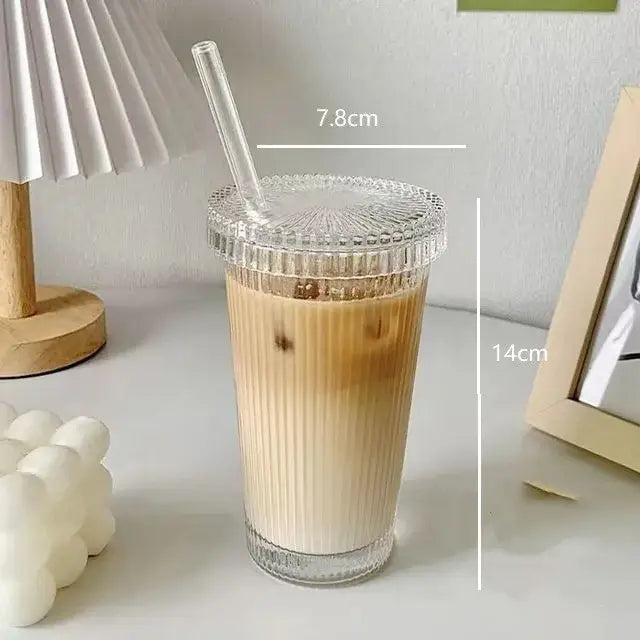 Elegant ribbed clear glass straw cup with matching textured lid and straw from decorbites glass drinkware collection