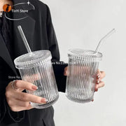 Clear glass ribbed glass straw cup with vertical ridges and matching lid featuring integrated straw by decorbites glass