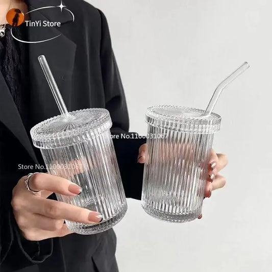 Clear glass ribbed glass straw cup with vertical ridges and matching lid featuring integrated straw by decorbites glass