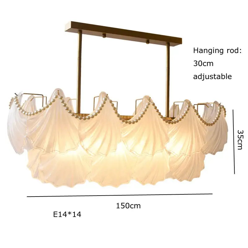 Elegant cream-colored pearl chain chandelier with gold metal frame featuring decorbites crystal pearl accents for dining room decor