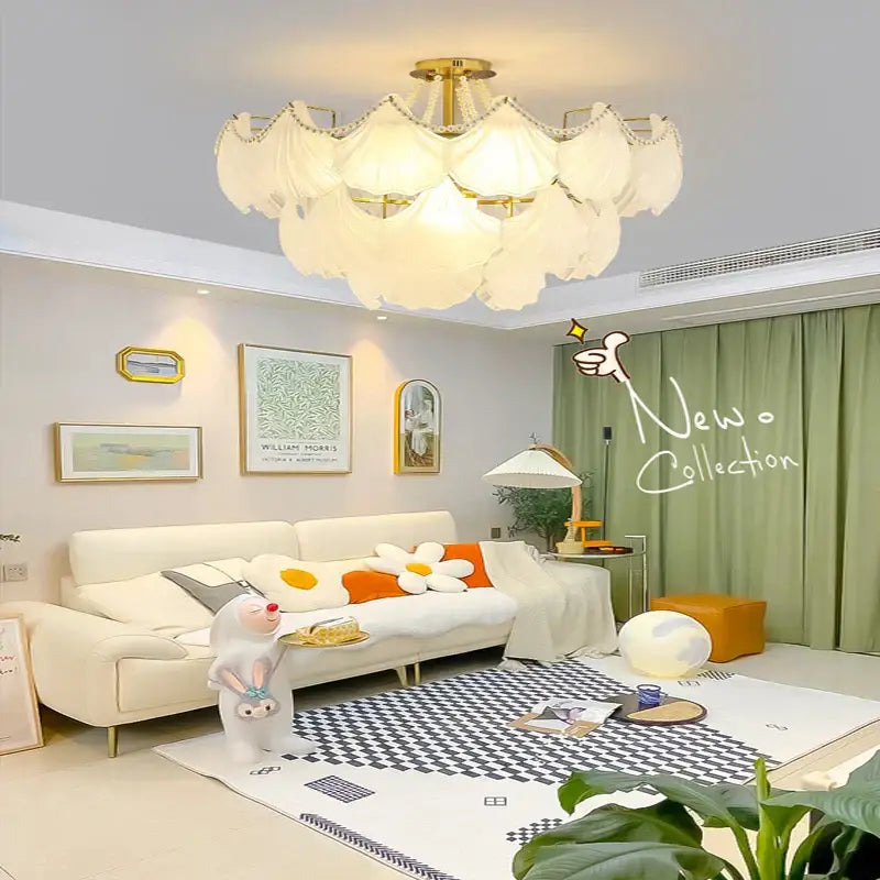 Elegant gold metal pearl chain chandelier with white petal-shaped fabric shades for dining room decorbites crystal pearl