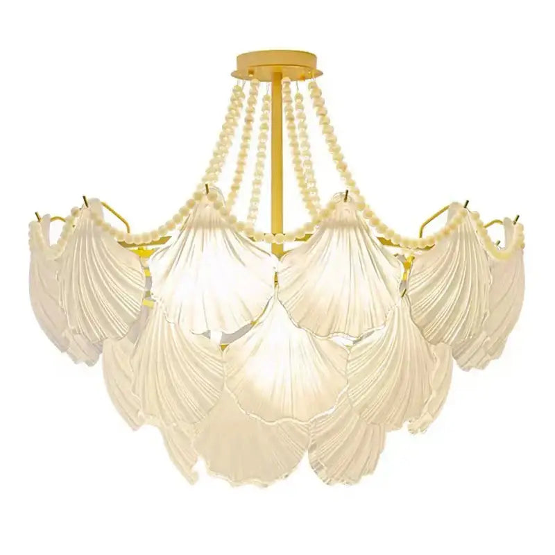 Elegant off-white shell pearl chain chandelier with gold-toned metal frame and crystal pearl chain accents for dining room decorbites