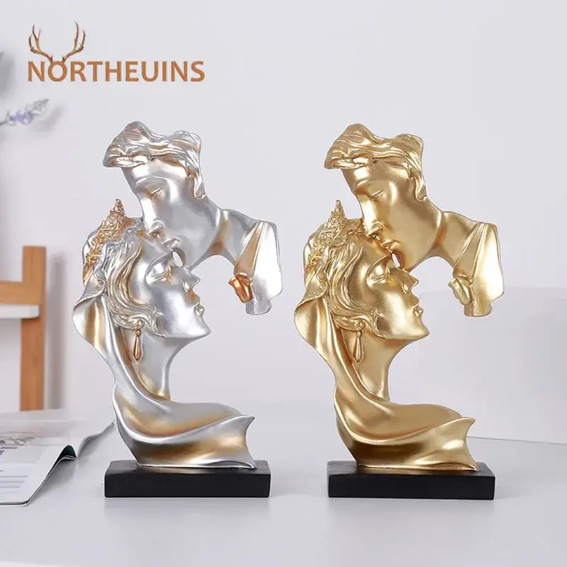 Two elegant silver and gold 26cm resin kissing couple sculptures with ornate crowns for home decor