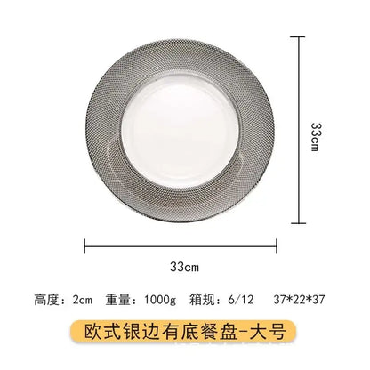 A round 33cm diameter european-style white glass steak and pasta plate with a silver-edged rim from tableware collection