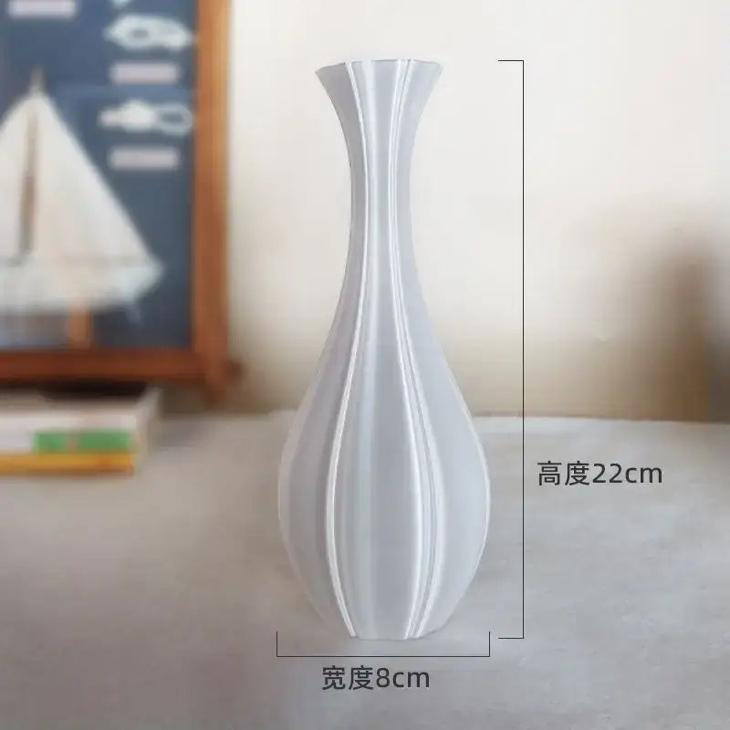 A sleek white ceramic decorbites elegant high-end vase with fluted hourglass silhouette for living room decor