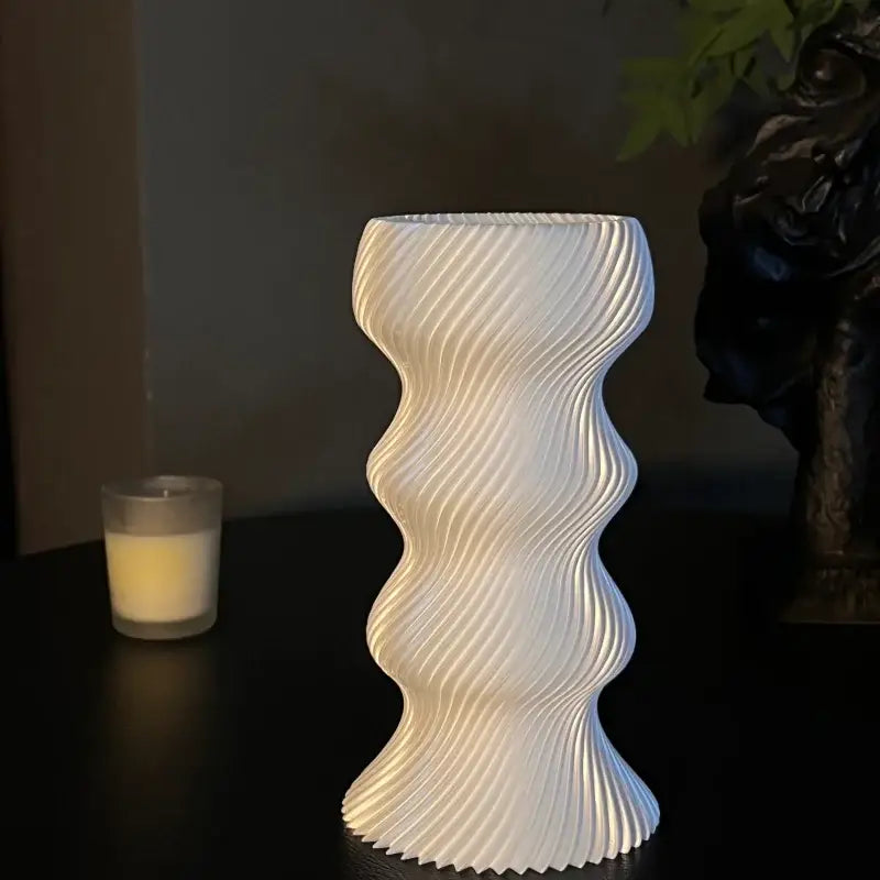 A sleek white ceramic vase with modern vertical ridges and flared base for decorbites elegant living room decorbites high-end