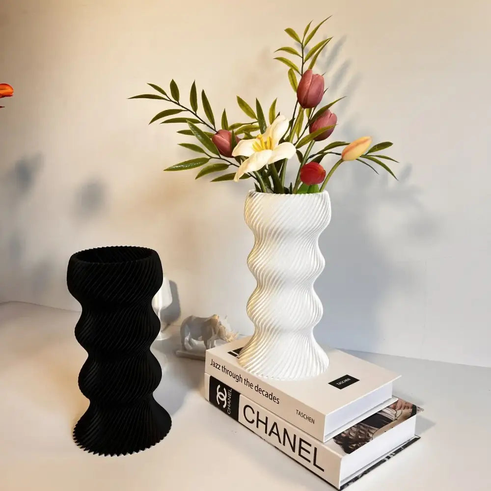 White ceramic vase with wavy ribbed texture and flared opening decorbites elegant high-end living room decor