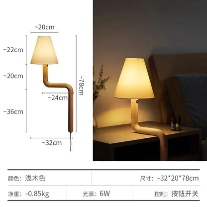 Elegant solid wood table lamp with a curved wooden base and beige fabric shade for warm bedroom decorbites elegant solid light