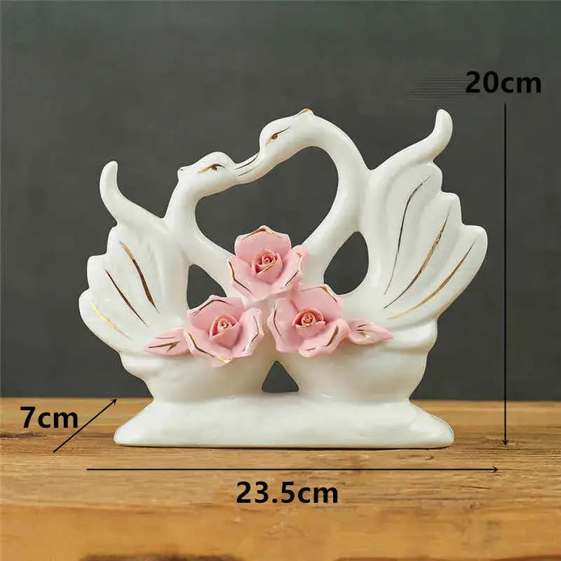 Elegant swan sculpture white ceramic figurine with pink roses for living room decorbites elegant swan decor