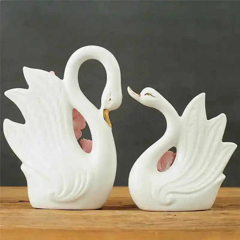 Elegant swan sculpture figurines white ceramic with gold beaks and pink floral accents for living room decorbites decor