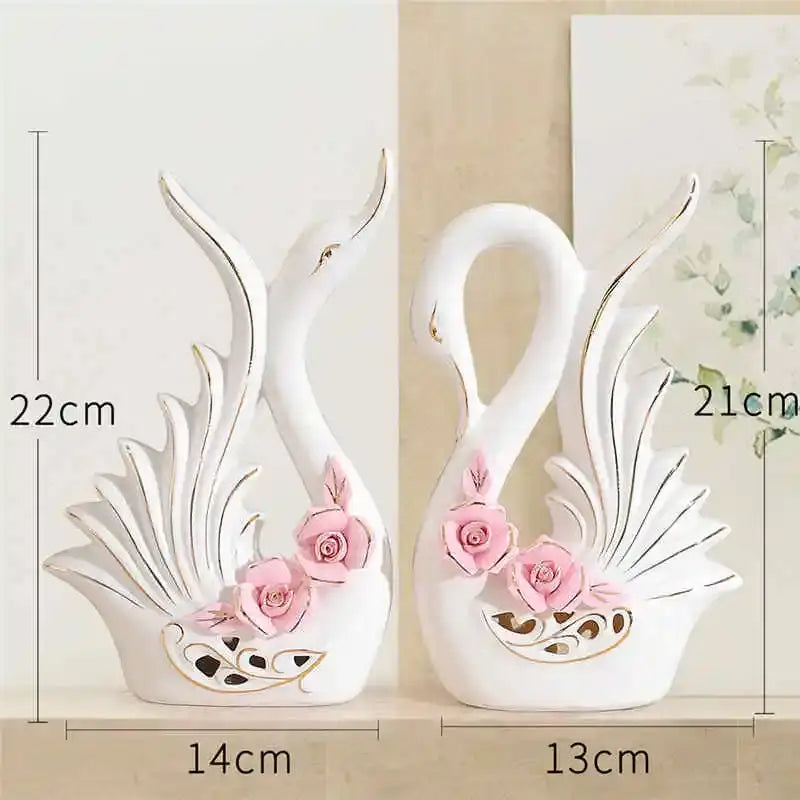 White ceramic elegant swan sculpture figurines with pink roses and gold detailing for living room decorbites decor