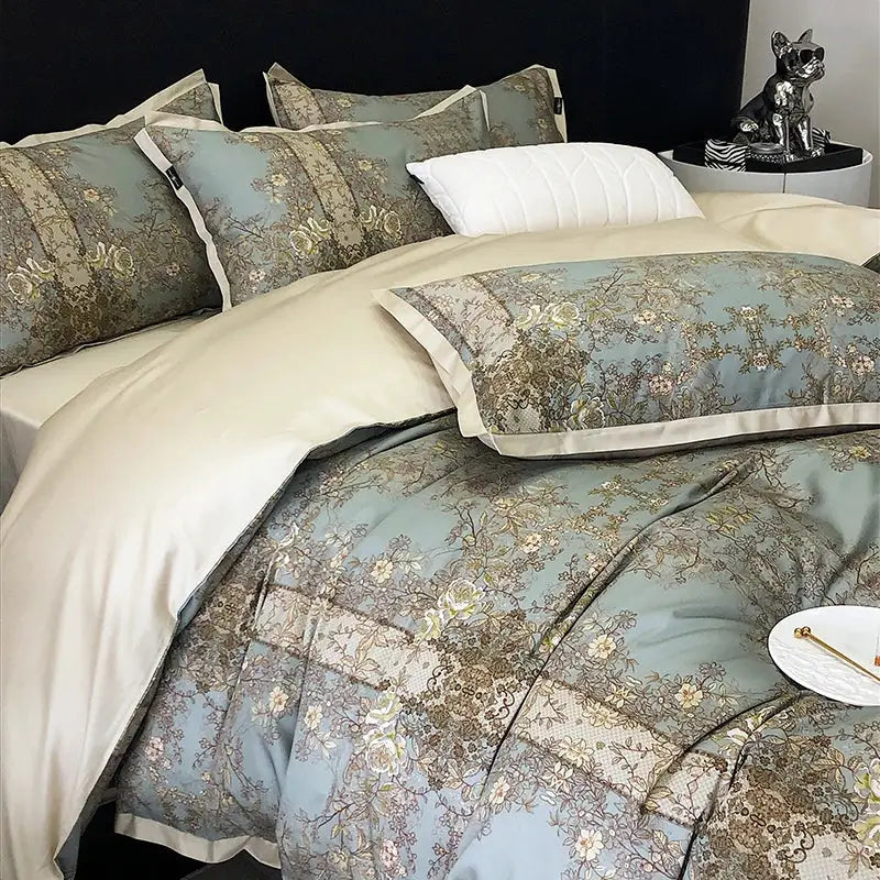 Elegant light blue and gold floral patterned satin luxury bedding set with cream accents for a stylish bedroom duvet cover