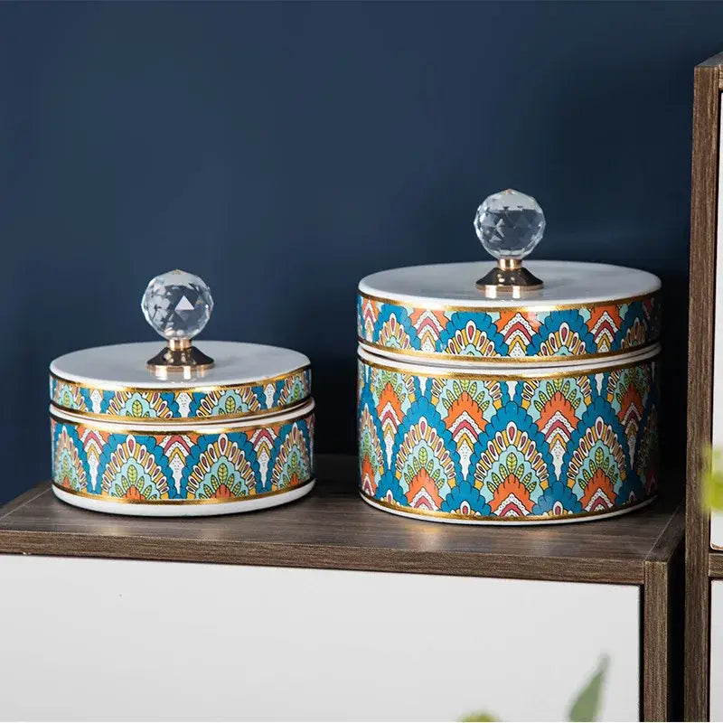 Elegant white and gold crystal ball ceramic jewelry box with decorbites crystal ball knobs and vibrant geometric patterns