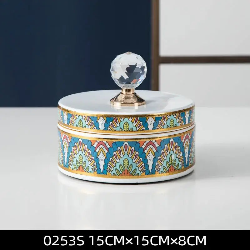 Elegant white and gold crystal ball ceramic jewelry box with vibrant blue and multicolored decorbites crystal ball body