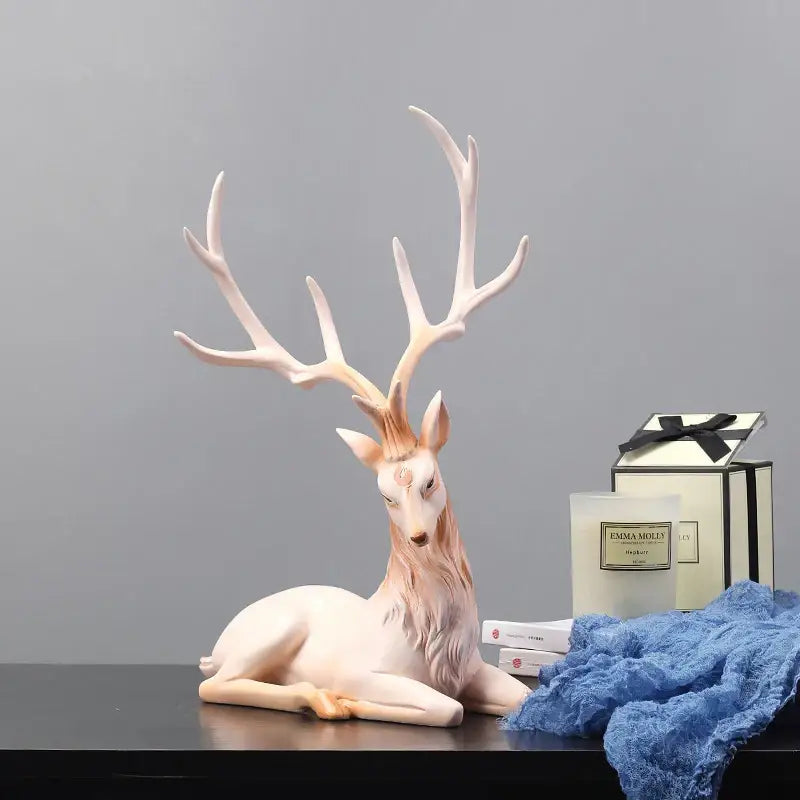 A delicate white resin elk figurine with pink undertones and intricate antlers for decorbites deer sculpture decor