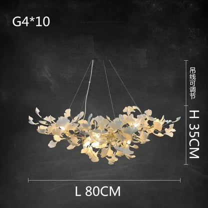 Elegant white and gold ceramic chandelier with a delicate cream floral design featuring ginkgo branch decorbites accents
