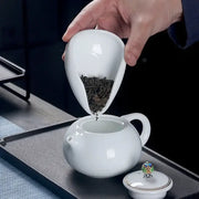 Elegant white ceramic tea spoon with smooth glossy finish and curved design from decorbites dose trays set