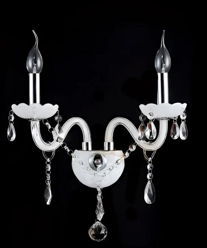 Elegant white crystal wall lamp featuring silver and clear crystal candle arms with teardrop crystals for decorbites crystal wall use