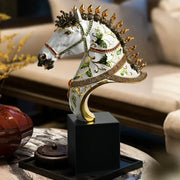 Elegant white enamel horse sculpture with gold accents green leaf patterns and embedded gemstones for living room decor
