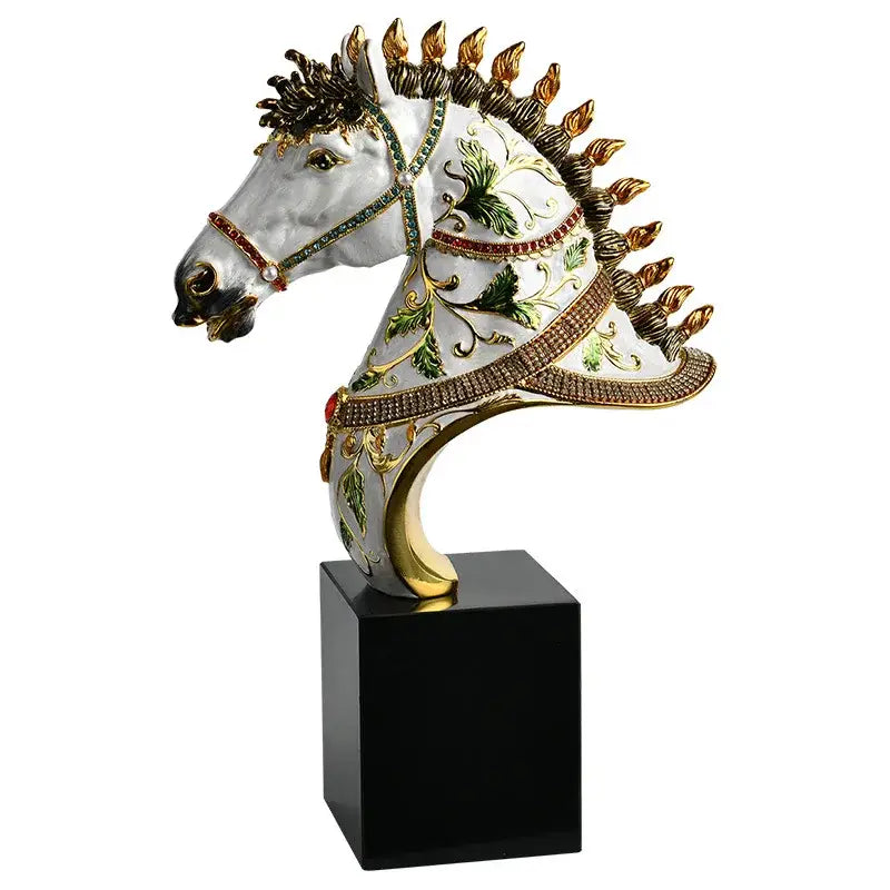 Elegant white enamel horse sculpture with gold accents green leaf patterns and red gemstones on a black pedestal decor