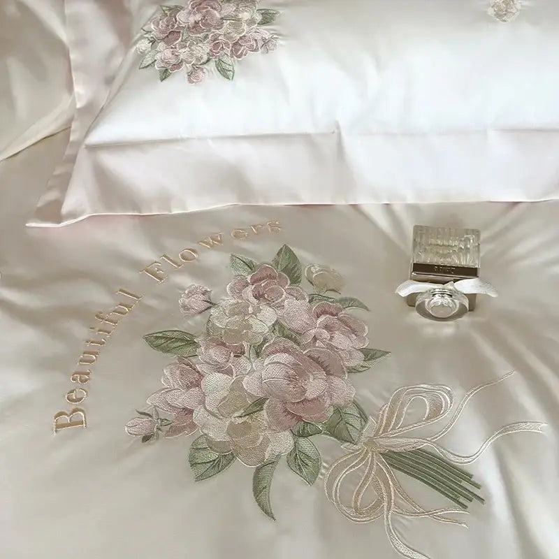 Elegant cream satin bedding set with delicate pink green decorbites flowers embroidery lace and beautiful flowers script accent
