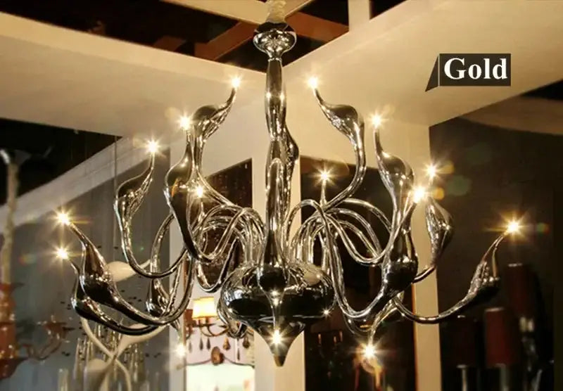Elegant white glass iron swan pendant chandelier with gold-toned sleek curved design for living room decorbites iron swan