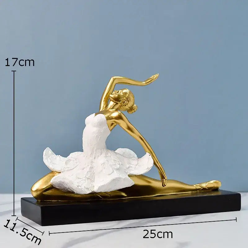 Elegant white and gold ballet dancer resin sculpture with flowing skirt on black base ideal for desk decor