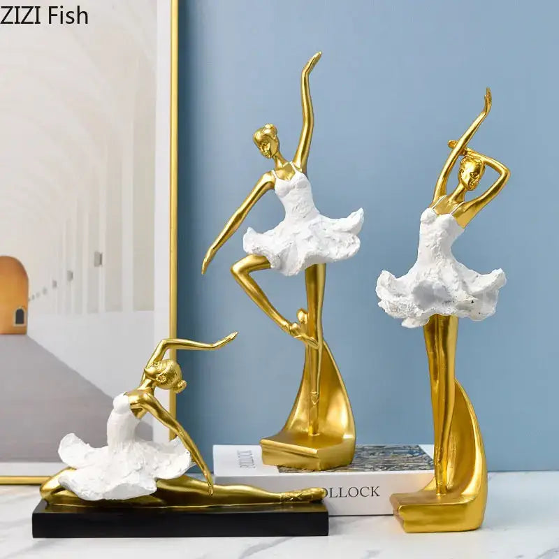 Three elegant golden ballet dancer resin sculptures with white textured tutus for bedroom decor or desk display