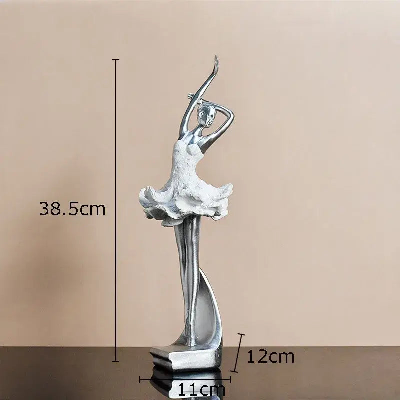 Elegant white and gold ballet dancer resin sculpture with silver figurine and flowing tutu on sleek metallic base for decor